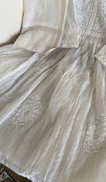 Kurta laid flat with the dupatta, do taar and teen taar chikankari