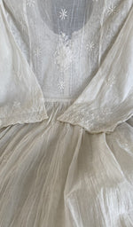 The dupatta spread out, white mul chanderi