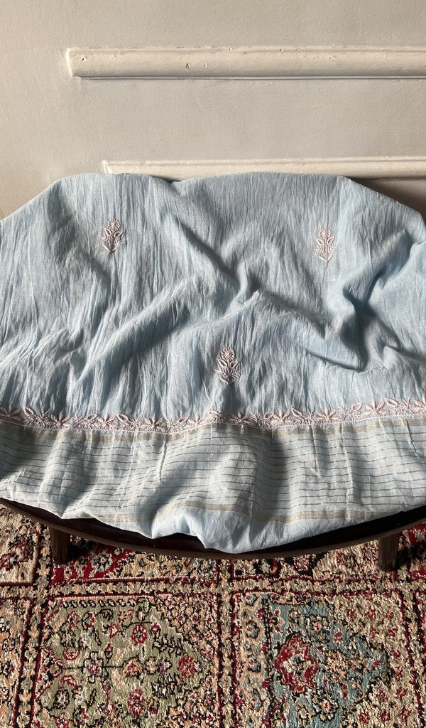 Light blue pure mul chanderi chikankari 3 pc unstitched suit set laid out