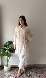 Nude stitched kurti on the model, full length, front
