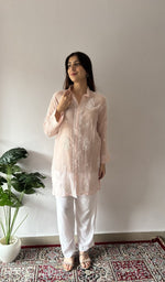 Neckline and placket in close up