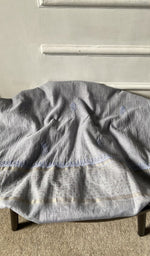 Bottom fabric draped over the stool