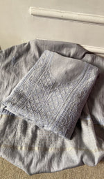 The folded set, kurta on top