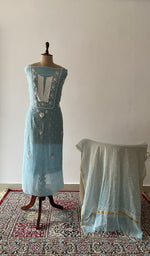The set on the mannequin with its dupatta beside it