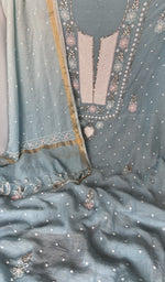 Badla work and beadwork across the body of the kurta piece