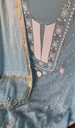 Beads and cutdana along the placket