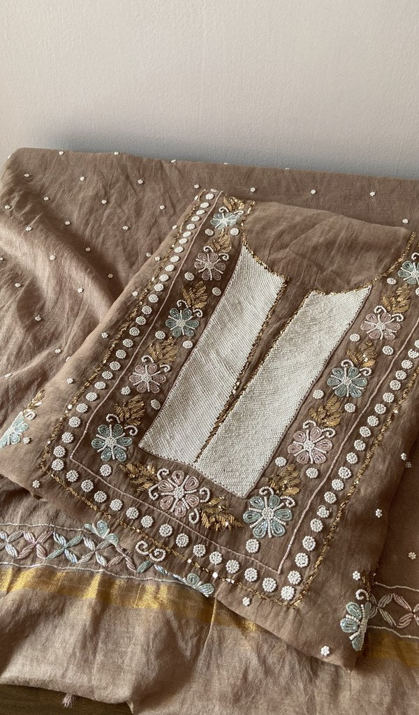 Dusty Rose pure mul chanderi kurta piece folded, beads badla work mukaish work and multicoloured cutdana in view