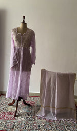 The set on the mannequin with its dupatta beside it