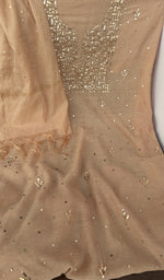 Kurta laid flat with the dupatta, allover badla work with gala and boota pattern