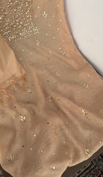Allover badla work with gala and boota pattern on the peach kurta