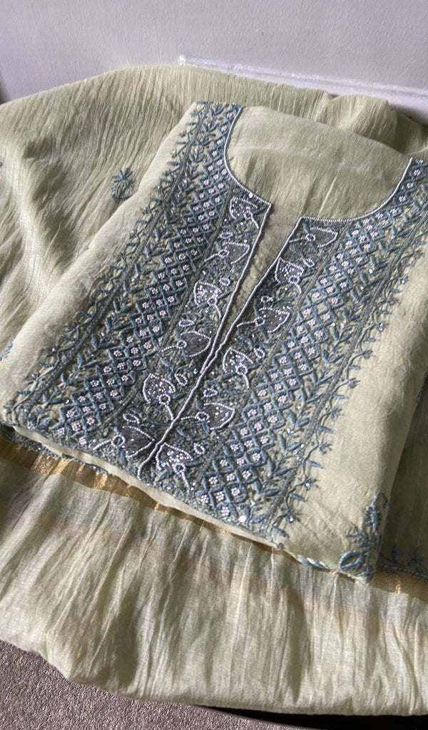 off white pure mul chanderi chikankari suit set, folded
