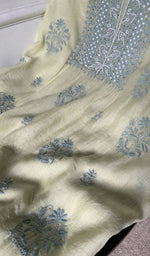 close view of the fine chikankari on gala and boota with beads and sequins on neck highlighting