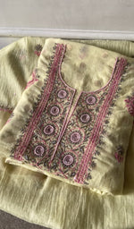 yellow pure mul chanderi kurta piece folded, fine contrast chikankari with beads cutdana and sequins on n