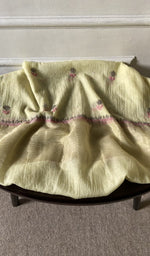 Bottom fabric draped over the stool