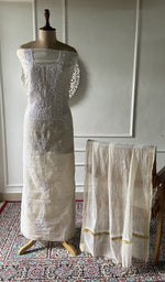 将图像加载到图库查看器中， Ivory mul chanderi chikankari 3 pc unstitched suit set laid out