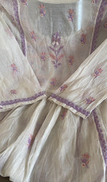 Close view of the white kurta fabric