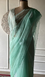 将图像加载到图库查看器中， Border and hem of the mint green pure organza silk
