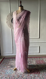 将图像加载到图库查看器中， Pink pure organza silk chikankari saree laid out