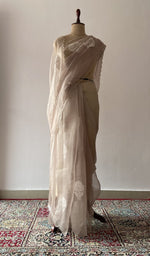Grey pure organza silk saree draped on the mannequin