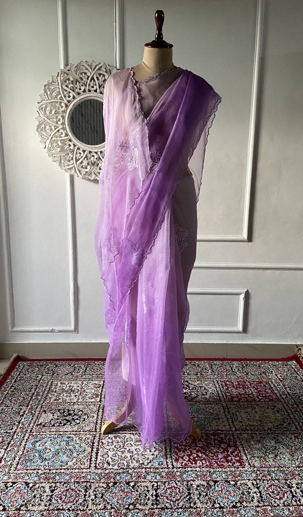 Lilac pure organza silk chikankari saree laid out
