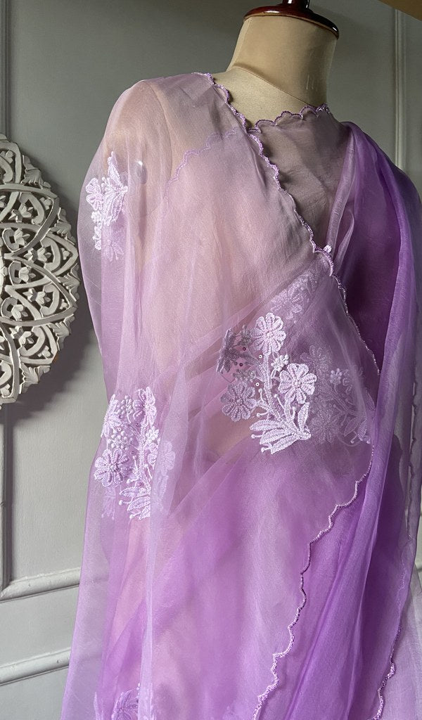 Chikankari across the body of the lilac kurta piece