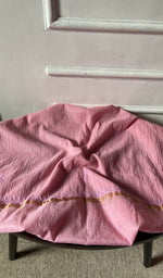 Bottom fabric draped over the stool
