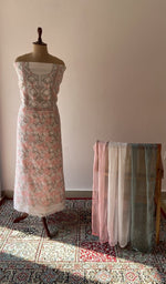 The set on the mannequin with its dupatta beside it
