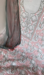 Motifs across the body of the white kurta