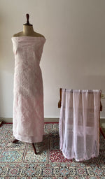 The set on the mannequin with its dupatta beside it