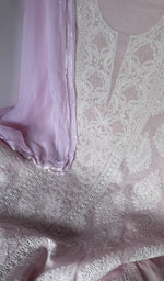 Motifs across the body of the pink kurta