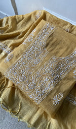 yellow pure mul chanderi chikankari suit set, folded