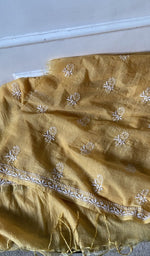 border and hem of the yellow kurta piece