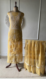 yellow pure mul chanderi chikankari set on the mannequin with the dupatta