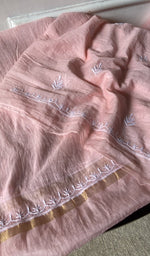 border and hem of the pink kurta piece