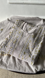 grey pure mul chanderi kurta piece folded, fine chikankari with haath ki jaali on semi stitch gathers s