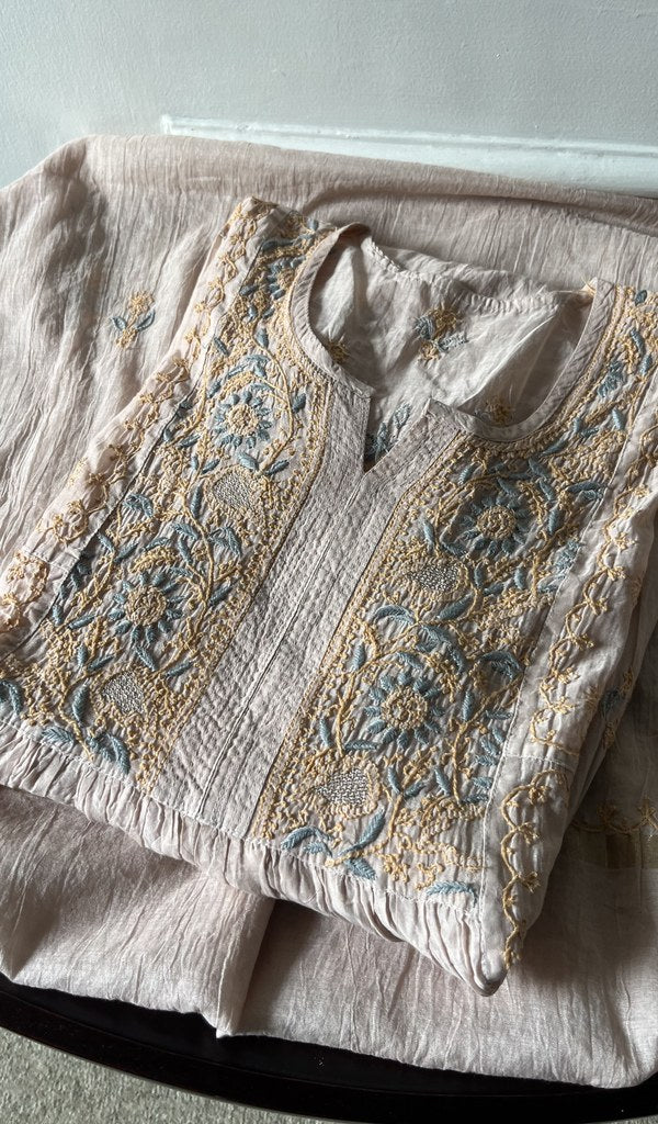 pink pure mul chanderi kurta piece folded, fine chikankari with haath ki jaali on semi stitch gathers s