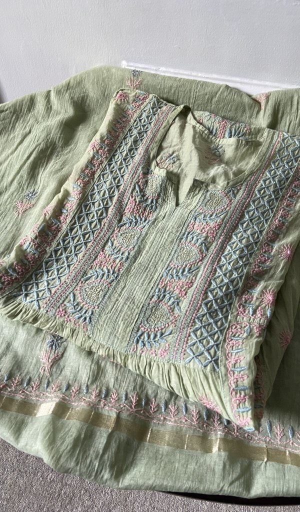 green pure mul chanderi chikankari suit set, folded