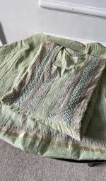 border and hem of the green kurta piece