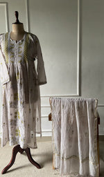 The set on the mannequin with its dupatta beside it