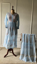 The set on the mannequin with its dupatta beside it