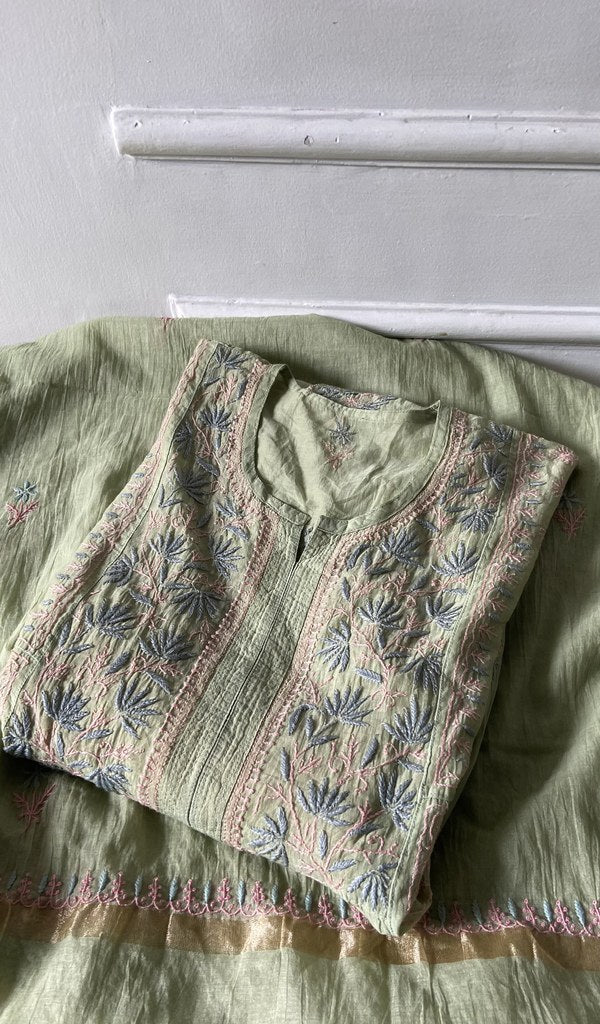 green pure mul chanderi kurta piece folded, fine chikankari with haath ki jaali on semi stitch gathers s