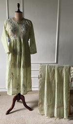 The set on the mannequin with its dupatta beside it