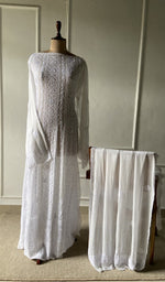 The set on the mannequin with its dupatta beside it