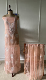 The set on the mannequin with its dupatta beside it