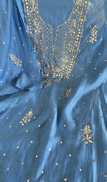 Motifs across the body of the blue kurta