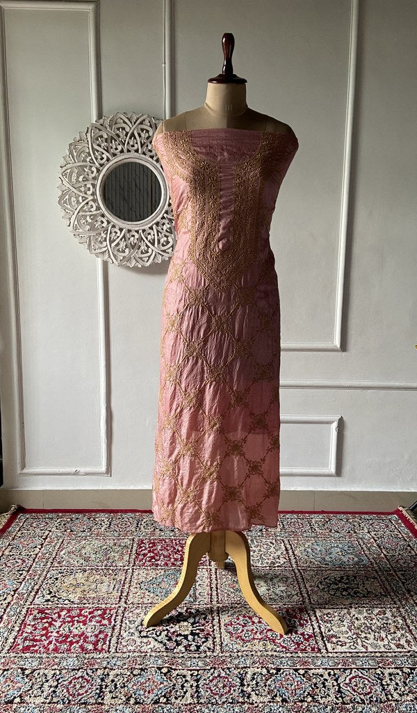 Rose pink pure tussar silk chikankari unstitched kurta fabric laid out