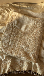 Folded beige tussar silk kurta, front view