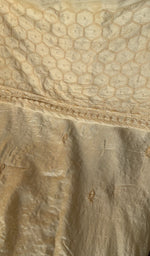 Close view of the beige kurta fabric