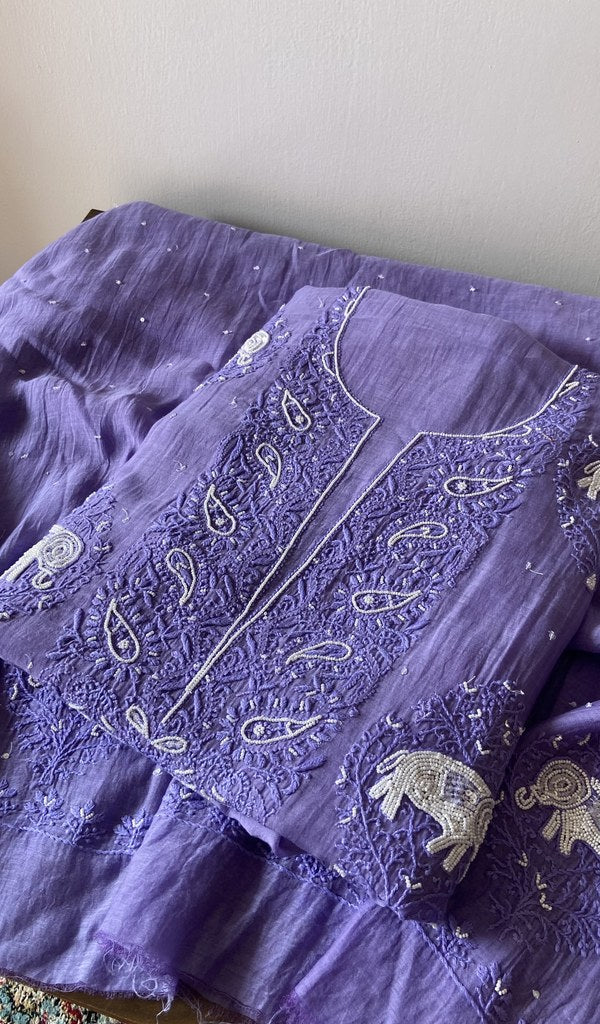 The set folded, kurta over dupatta