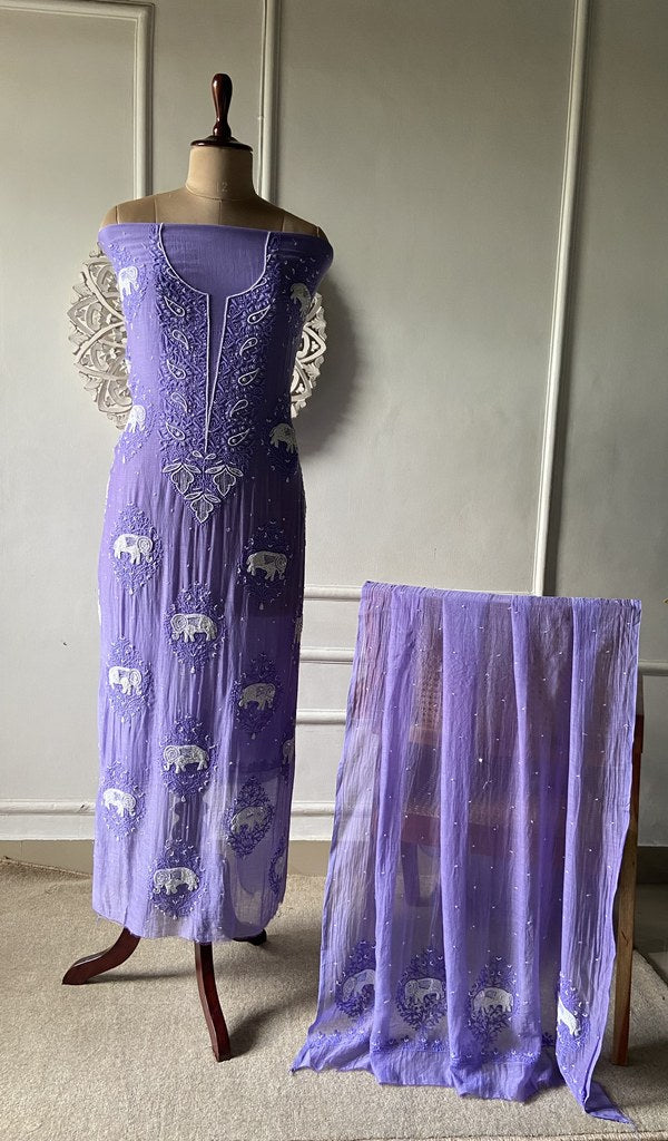 Purple suit set on the mannequin with its dupatta